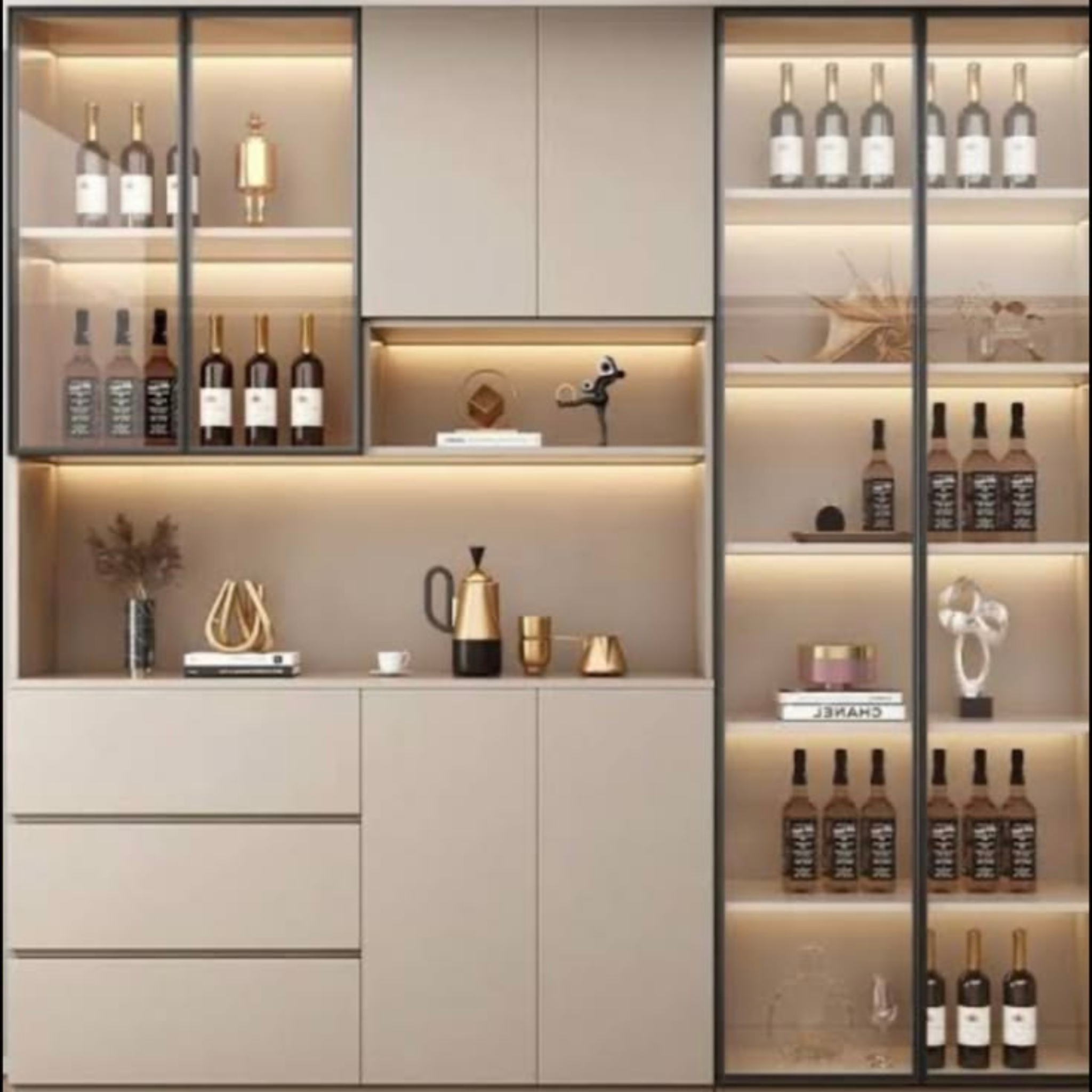 Modern sideboard-style crockery and bar unit featuring neutral matte finishes, black-framed glass-shutter display towers, a central serving counter with backlit open shelving, and lower drawers and cabinets.
