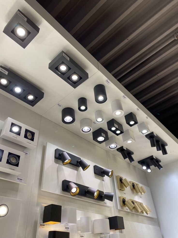 Houseway architectural lighting installation and modern light fixture display in Hyderabad, featuring surface-mounted spotlights, downlights, and adjustable wall sconces.