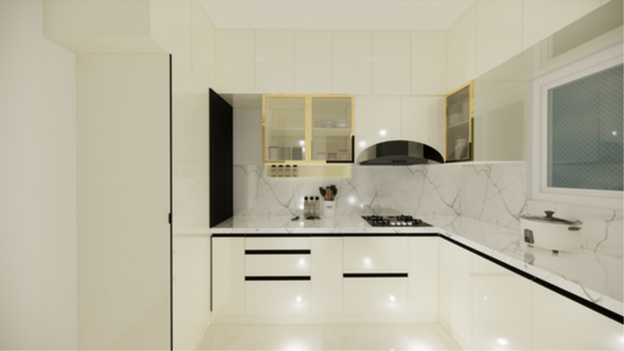Luxury cream and gold U-shaped modular kitchen featuring high-gloss cream cabinets, gold-trimmed glass upper units, and marble backsplashes in Hyderabad.